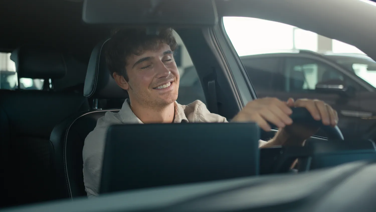 Muzikos klausymasis automobilyje